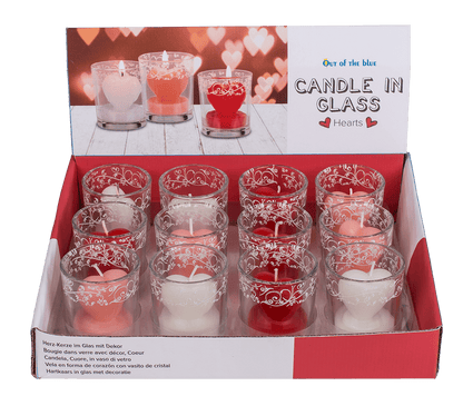 Candle in glass with decor, heart,