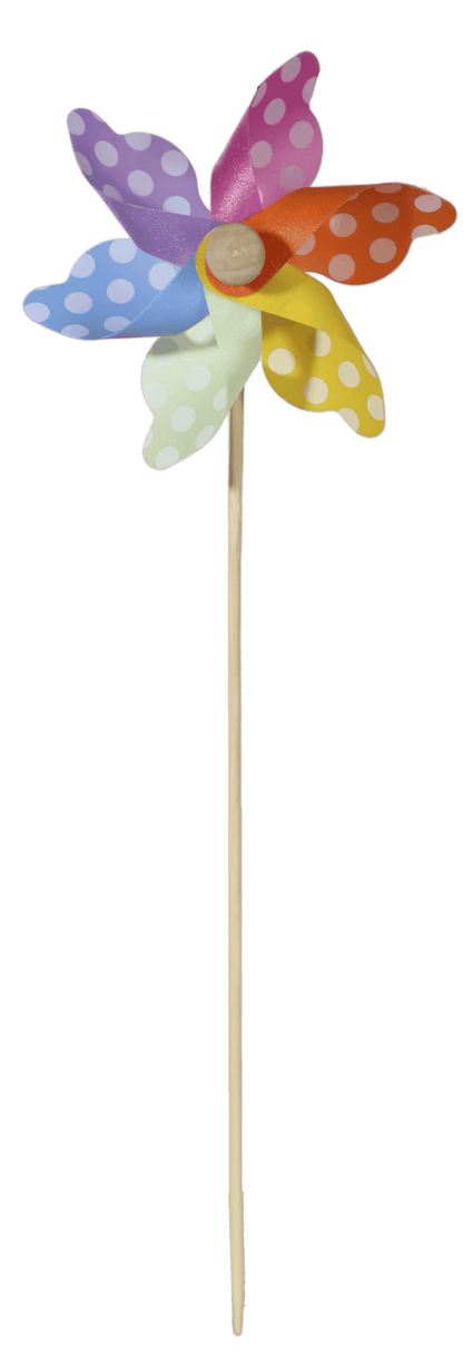 Multicoloured windmilll with white dots on wooden,