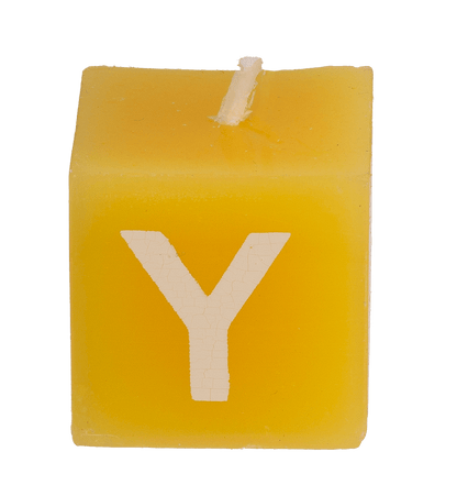 Multi coloured square candles with letters,