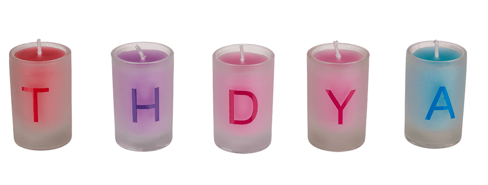 Coloured candles in glass, Happy Birthday,