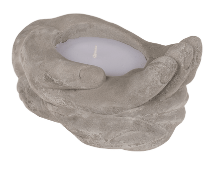 Candle in cement hands