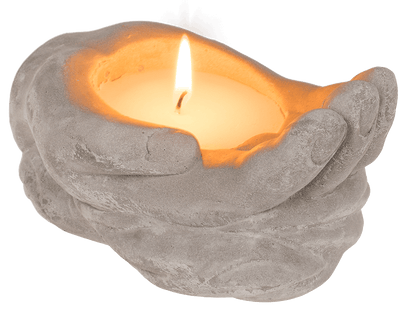 Candle in cement hands