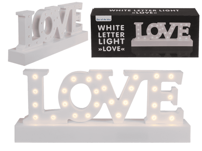 White plastic letter light, Love,