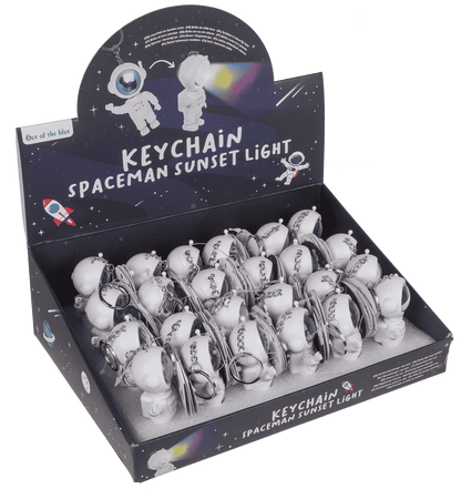 Metal keychain. Spacemen sunset light,