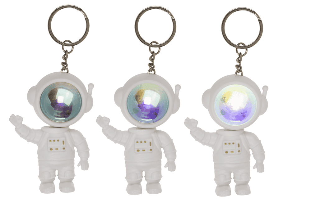 Metal keychain. Spacemen sunset light,