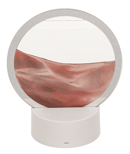 Rotating sand picture, with colour-changing LED