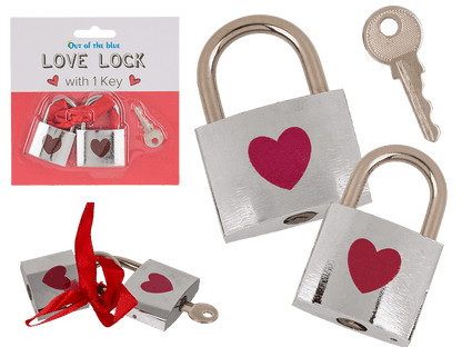 Silver coloured love lock with red heart,