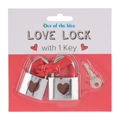 Silver coloured love lock with red heart,