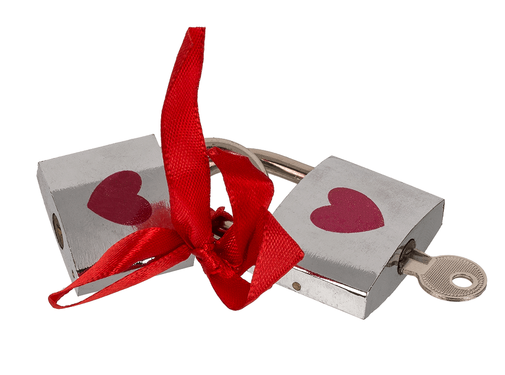 Silver coloured love lock with red heart,