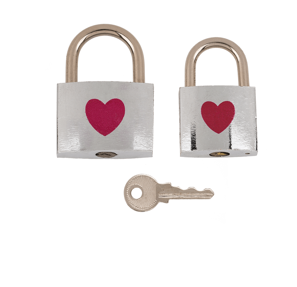 Silver coloured love lock with red heart,