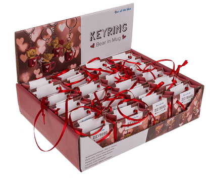 Metal keyring, polyresin bear in mug,