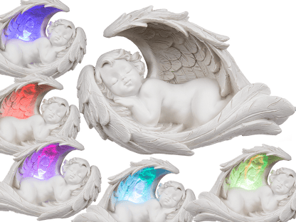 Sleeping polyresin angel in wings with colour,