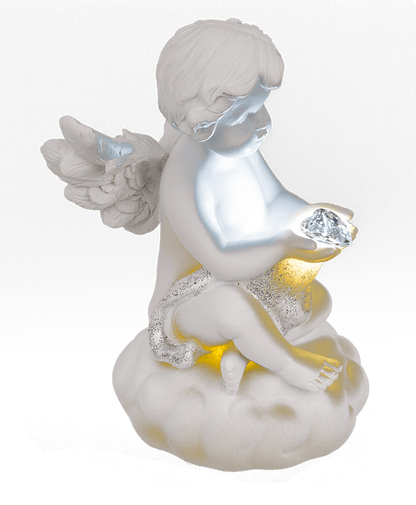 Sitting polyresin angel with white LED heart,
