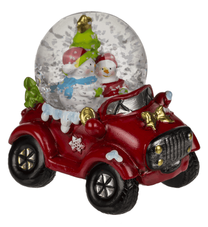 Polyresin snow globe with Christmas figurines on,