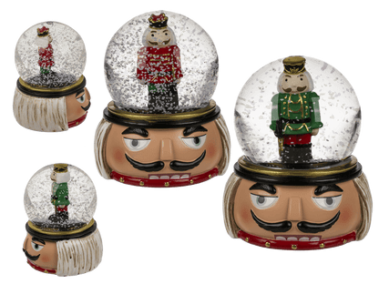 Polyresin snow globe with nutcracker,