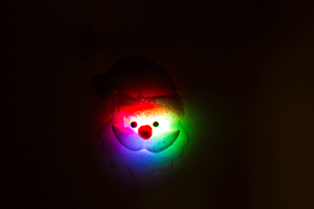 Fabric Santa pin with LED incl. batteries,